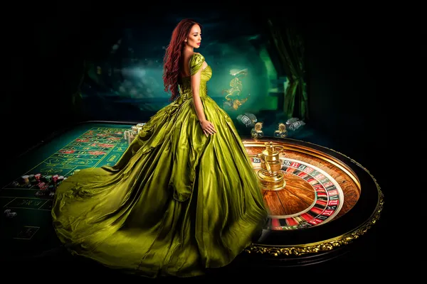 A woman in a luxurious green gown next to an ornate roulette wheel, capturing the upscale casino mood of 1111BED.